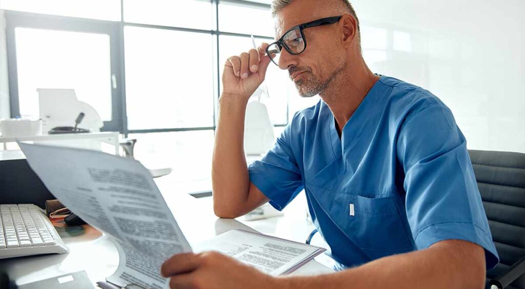 A healthcare professional reviewing a nexus letter shows the care and detail needed. Getting a strong VA nexus letter isn’t always easy — it takes the right info and support.