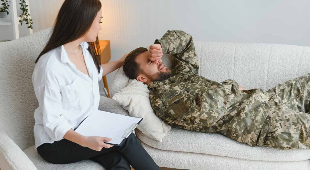 soldier having a therapy session reflects the vital role of mental health care in the VA claims process, where veterans must often prove their conditions are linked to military service to receive benefits.