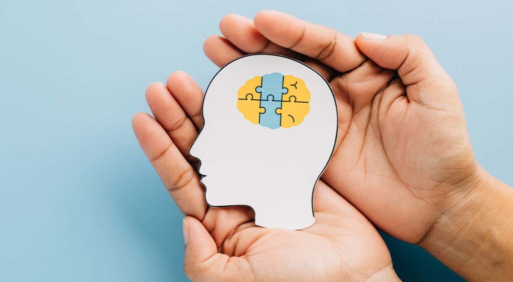 An illustration of the human brain symbolizes the complexity of mental health—and the challenges veterans face when seeking VA disability benefits.