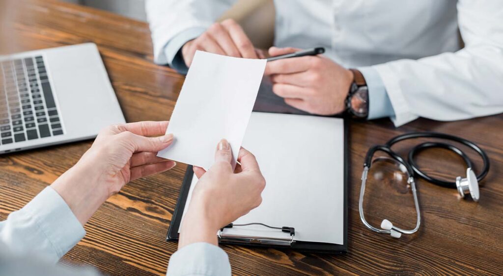 A doctor provides a veteran with a crucial medical letter—key evidence in supporting a stronger VA disability claim.